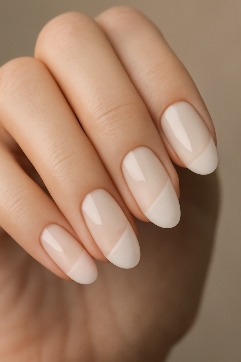 Milky nails with negative space designs on a milky base